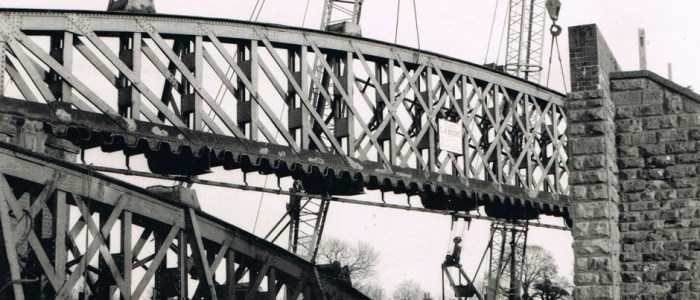 Archive photograph of railway demolition from L A Moore’s company history
